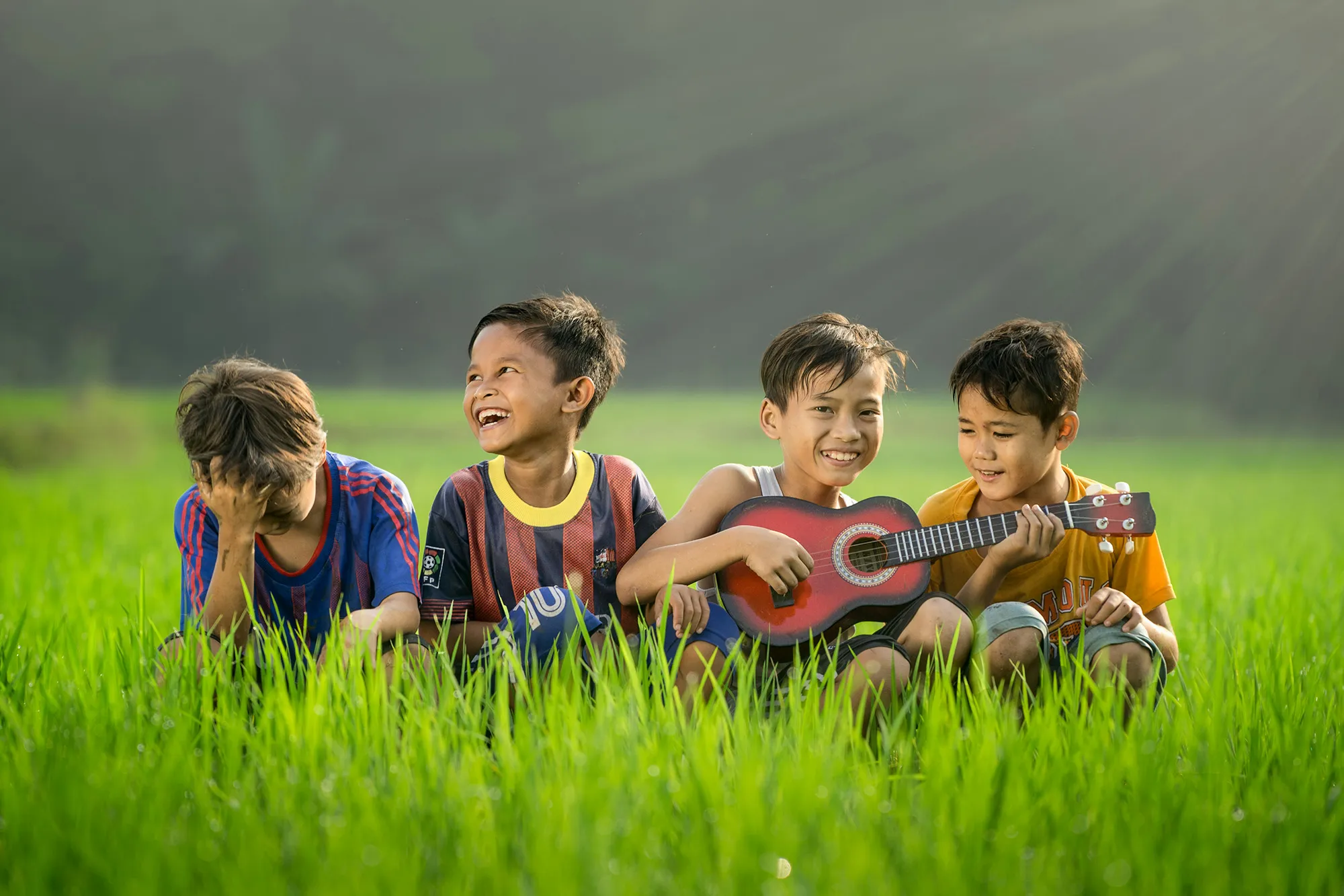 Happy boys with guitar